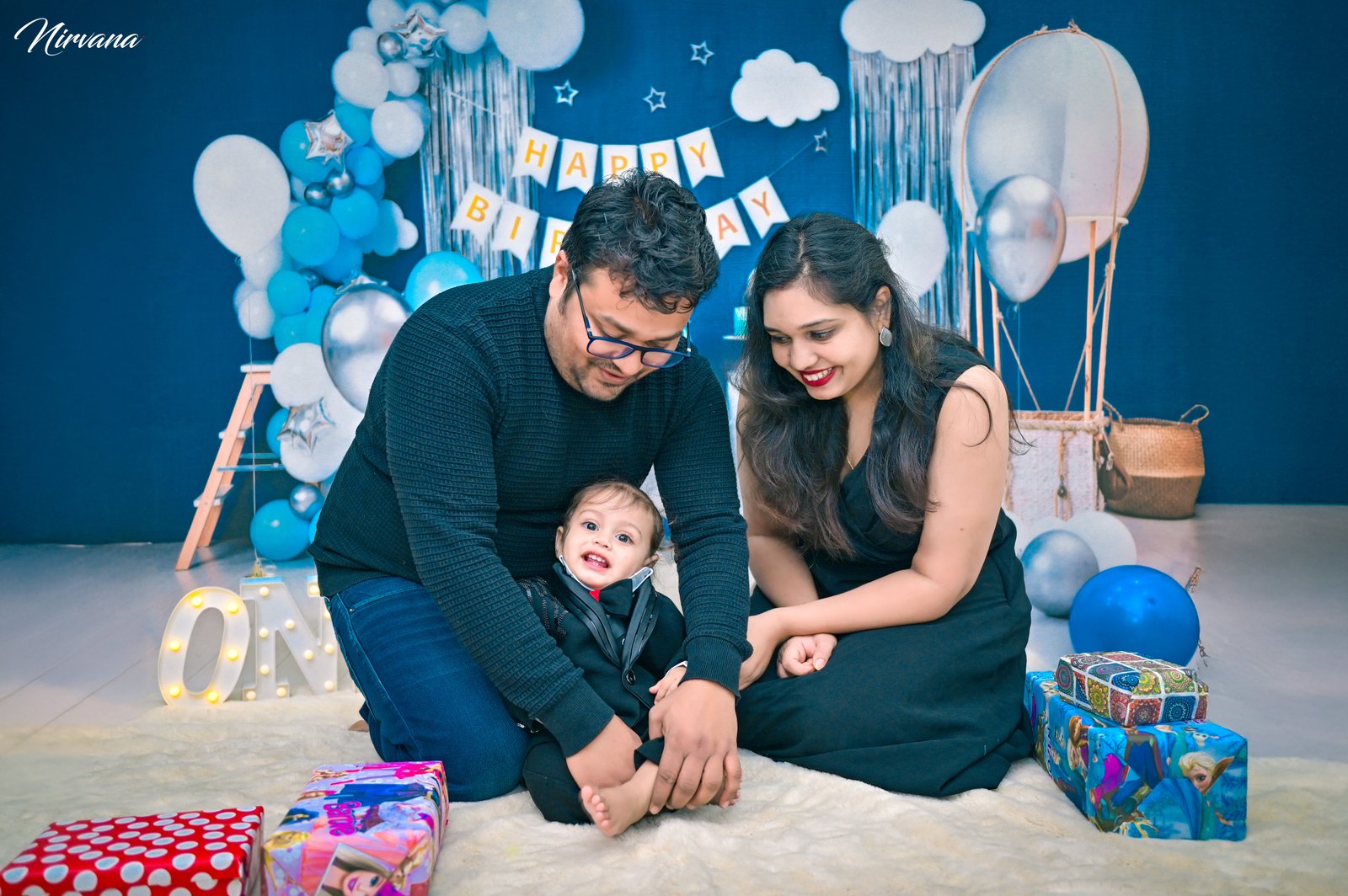Mother, father and baby celebrating a joyful family milestone Mother, father and baby celebrating a joyful family milestone