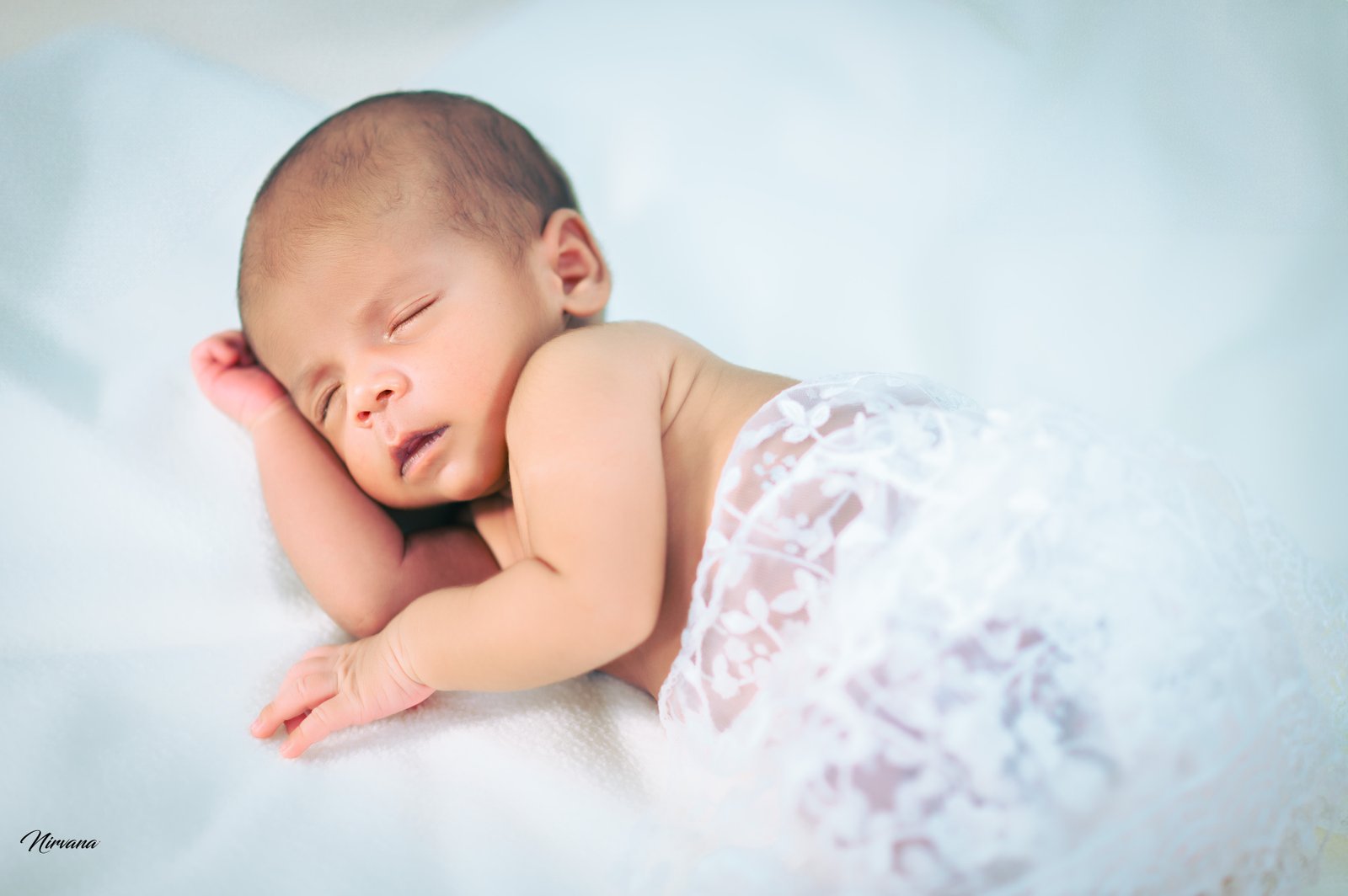 Sleeping newborn posed safely in the Nirvana studio Sleeping newborn posed safely in the Nirvana studio